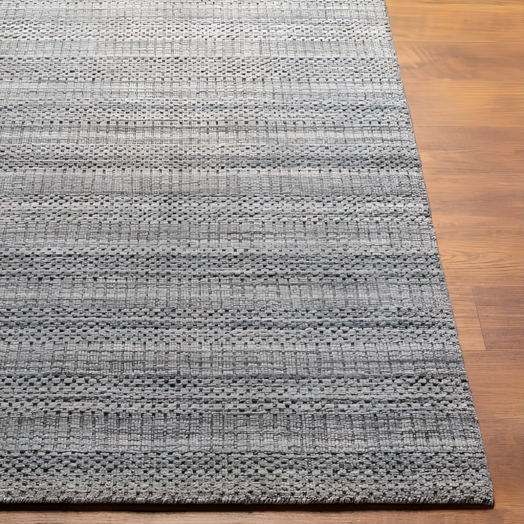 Surya Hickory HCK2303 hand-loomed rug in gray, charcoal, and cream recycled PET yarn with subtle textured stripes.