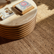 Surya Redondo coffee table with a beige polished marble top and ribbed beige lacquered mango wood base.