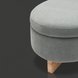 Round light green upholstered ottoman with natural wood tapered legs.