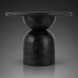 Surya Koben black mango wood dining table with a sandblasted finish and sculptural base.