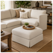 Taupe Surya Elenora ottoman with Crypton fabric, Trillium cushion, and square form, in a living room setting.