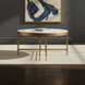 Surya Engel round coffee table with white marble top and metallic brass iron base.