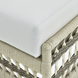 Cream Surya Winder outdoor ottoman with Sunbrella acrylic cushion and woven aluminum frame.