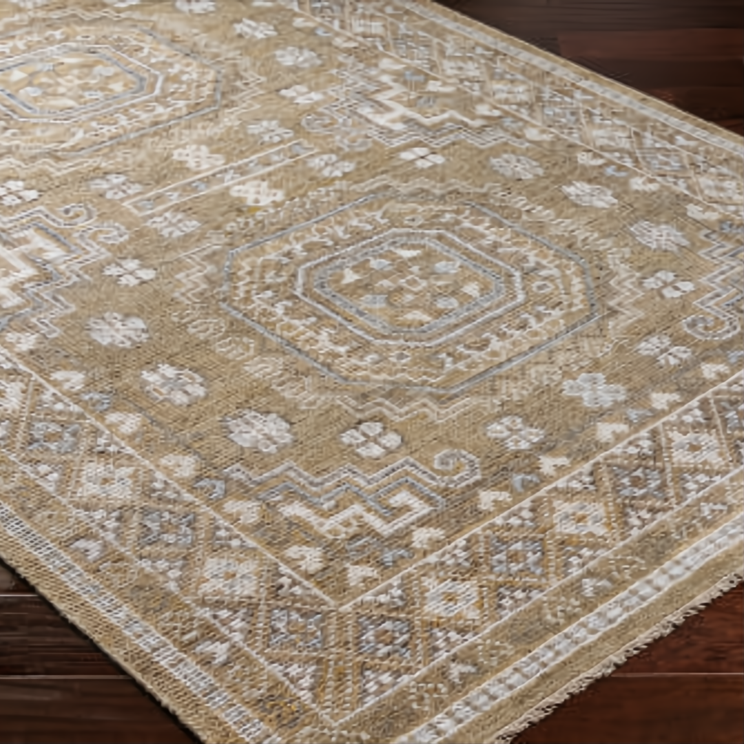 Surya Almeria hand-knotted low pile rug with mustard, gray, blue, beige, cream, and black geometric patterns.