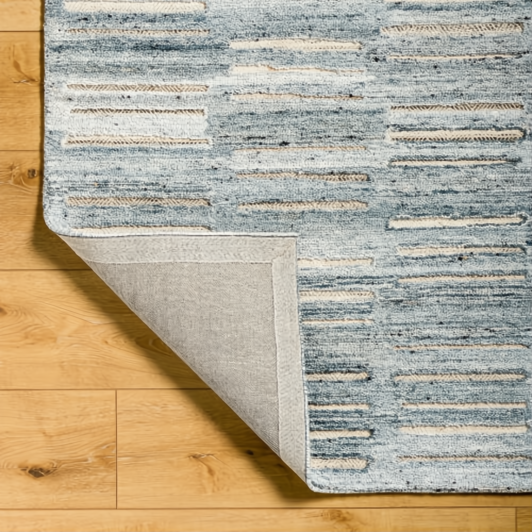 Surya Calgary CGR-2306-P hand-tufted rug in pale blue, dark blue, white, and light beige recycled PET yarn.