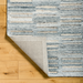 Surya Calgary CGR-2306-P hand-tufted rug in pale blue, dark blue, white, and light beige recycled PET yarn.