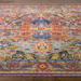 Hand-knotted wool Surya Cappadocia rug with intricate traditional patterns in Dusty Sage, Mauve, Blue, Mustard, and Olive.