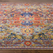 Hand-knotted wool Surya Cappadocia rug with intricate traditional patterns in Dusty Sage, Mauve, Blue, Mustard, and Olive.