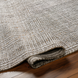 Surya Hope HOP-2300-P hand-loomed flatwoven rug in multi-tone neutrals, made from recycled PET yarn.