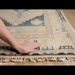 Hand-knotted Surya Anadolu AAU-2301 wool and viscose area rug with traditional patterns in cream and blue.