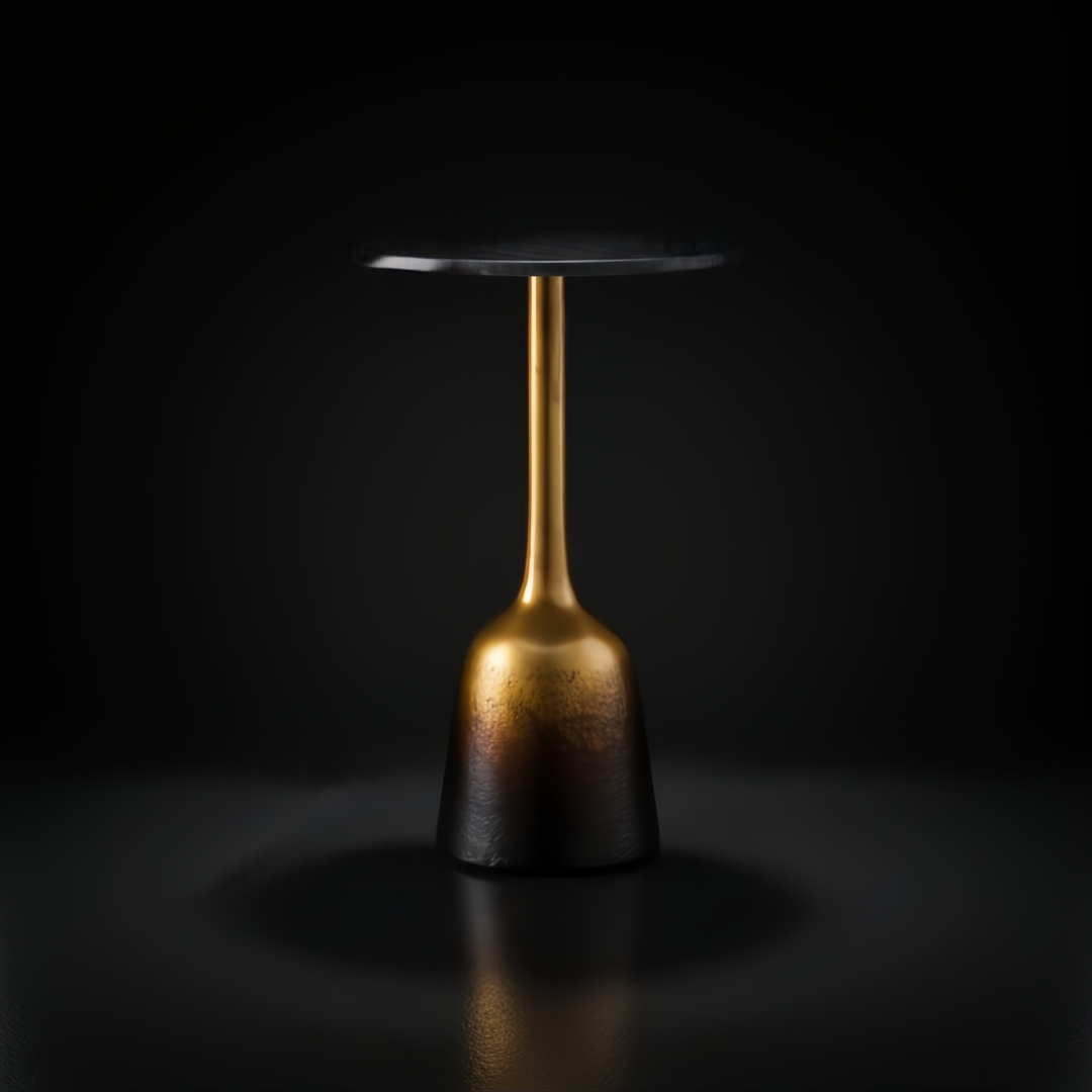 Surya Alva end table with a black marble top and metallic bronze iron base with an ombre finish.