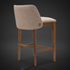 Surya Brooke counter stool with medium brown polyester upholstery and wheat-finished beechwood base.