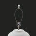 Surya Arion accent table lamp with a textured white ceramic base and metal harp, ready for a shade.