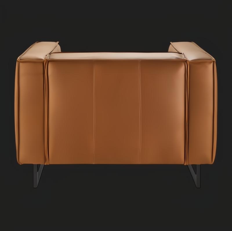 Surya Dylan modern accent chair with brown leather cover and black iron base.