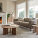 Surya Agnes round brown mango wood coffee table with beveled edge top and zigzag fluted legs.