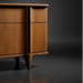 Grande Collection brown stained poplar dresser with minimalist modern design and tapered legs.