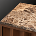 Brown marble top of a Surya Skopa mid-century modern cabinet with white oak base.
