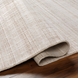 Surya Fresno FNO-2301-P hand-loomed area rug in neutral tan and beige, made from recycled PET yarn.
