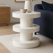 Cream iron Surya Roth End Table with tiered shelves, high gloss finish, 24"H.