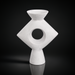 Modern white ceramic Yagya vase with a sculptural diamond shape and central circular cutout.