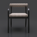 Surya Antibes dining arm chair with multi-color striped Sunbrella upholstery and black aluminum frame.