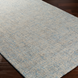 Surya Aiden AEN-1001 hand-tufted wool area rug in light blue and cream, featuring a medium pile.