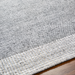Close-up of a hand-woven gray Surya Abby ABB-2300 area rug made from recycled PET yarn, showing its texture and no-pile design.