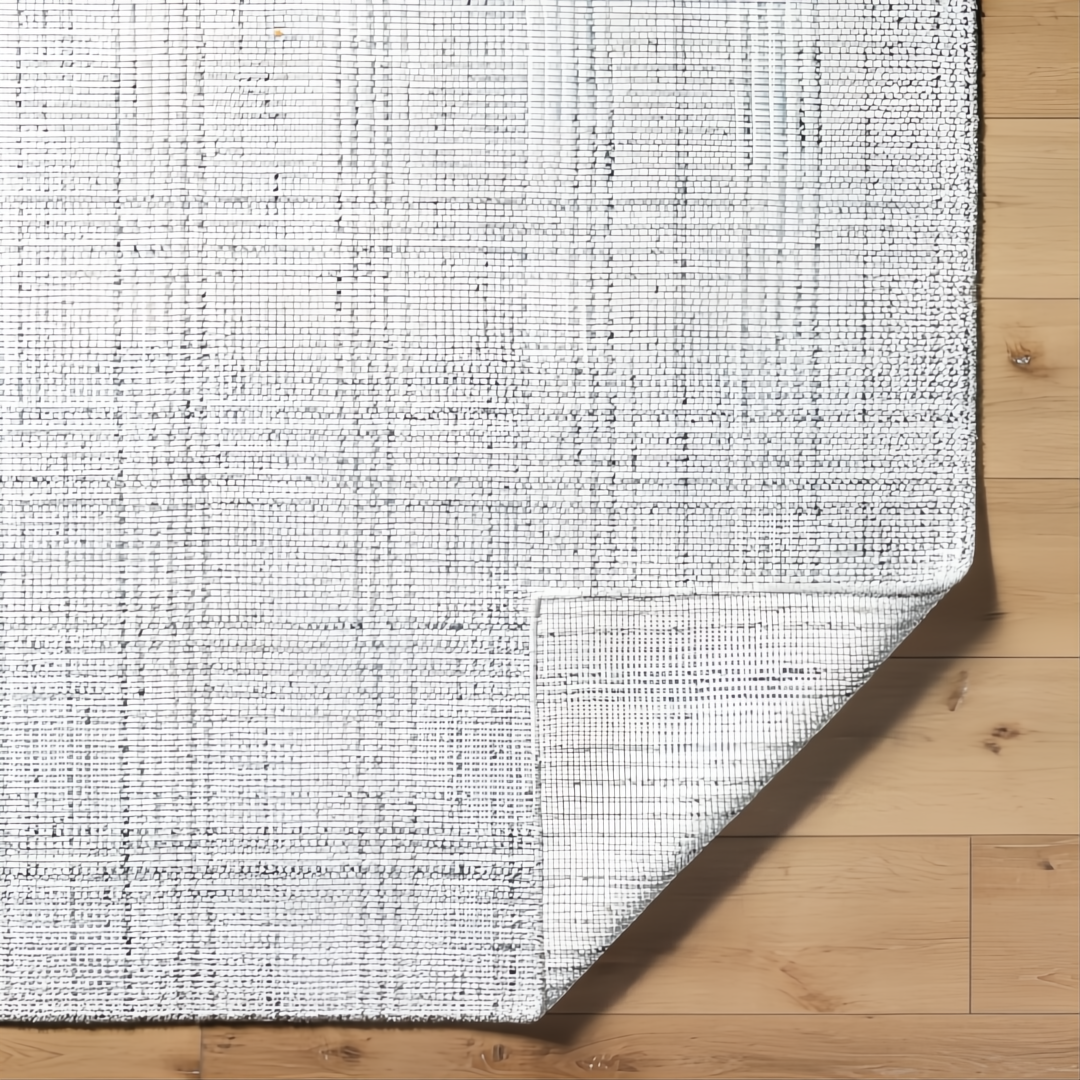 Surya Hope HOP-2303-P hand-loomed area rug in white, gray, and light slate recycled PET yarn.