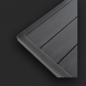 Close-up of the black hand-painted aluminum top of the Surya Fairborn Fire Table, showing its slatted design.