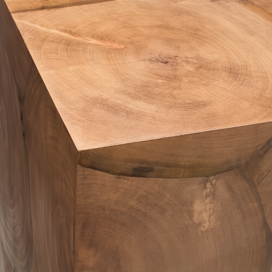 Surya Brax end table, a brown lacquered acacia cube with visible wood grain and knot variations.