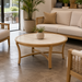 Surya Cape Town 42-inch round beige stone and aluminum outdoor coffee table with a hand-painted finish.