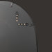 Back of a Surya Aamnah wall mirror showing black iron frame and vertical/horizontal mounting hardware.