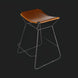 Modern Surya Celerio counter stool with brown lacquered leather seat and gray powder-coated iron base.