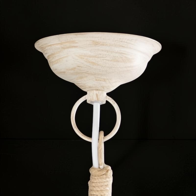 Distressed off-white ceiling canopy and chain hanging mechanism with rope detail for Surya Braylee Chandelier.