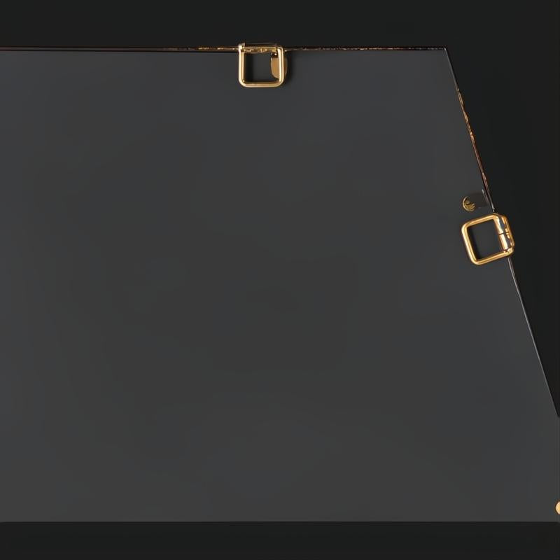 Back of a rectangular Surya Adams wall mirror with antiqued gold iron frame and hanging hardware.