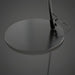 Close-up of the Astro Accent Floor Lamp's round black iron base and sleek black pole.