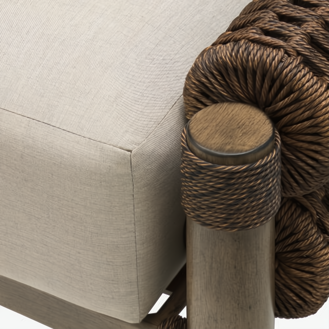 Close-up of Surya Porta Ottoman with beige Sunbrella cushion, brown woven rope, and hand-painted aluminum base.