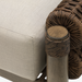 Close-up of Surya Porta Ottoman with beige Sunbrella cushion, brown woven rope, and hand-painted aluminum base.