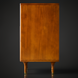 Madri dresser, minimalist modern design, brown poplar wood, with tapered legs and brass accents.