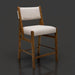Surya Bergene counter stool with light beige fabric upholstery and a brown natural rubber wood frame.