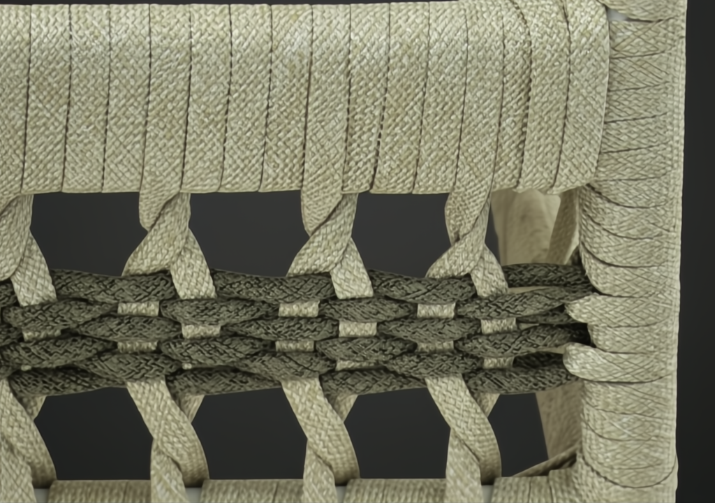 Close-up of Winder Sectional's handwoven cream and dark PE rope detail on a powder-coated aluminum frame.