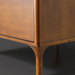 Madri dresser, a minimalist modern brown wood dresser with sleek, tapered legs.