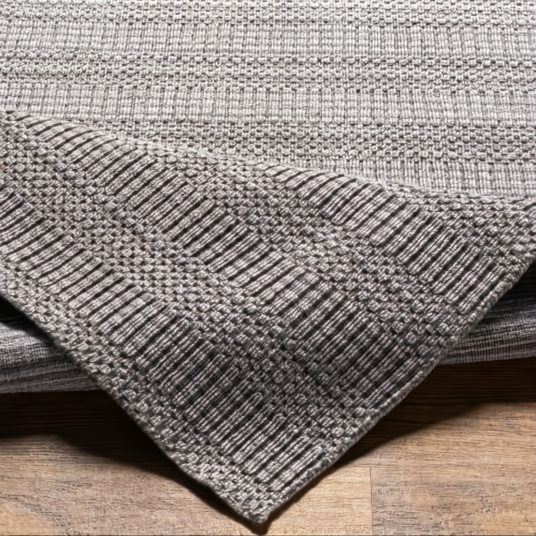 Surya Hickory HCK2304 area rug, hand-loomed from recycled PET yarn, in a neutral multi-tone gray.