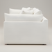 Surya Capitola accent chair, white polyester-linen upholstery, clean relaxed design with three pillows.