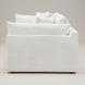 Surya Capitola accent chair, white polyester-linen upholstery, clean relaxed design with three pillows.