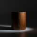 Dark brown mango wood end table with a modern curved design, accented with brass and a white marble base.