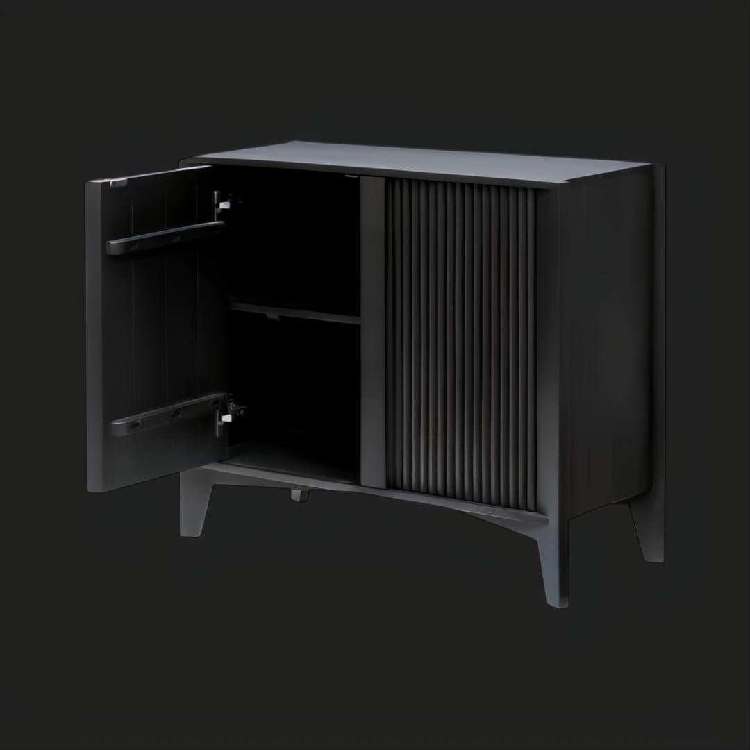 Black mango wood Surya Ronan Cabinet with one door open, revealing an adjustable shelf and soft-close hinges.