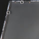 Back of a Surya Adams wall mirror, showing mounting hardware and dark gray backing.