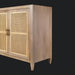 Modern brown and tan mango wood sideboard with rattan doors and brass handles.