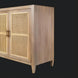Modern brown and tan mango wood sideboard with rattan doors and brass handles.
